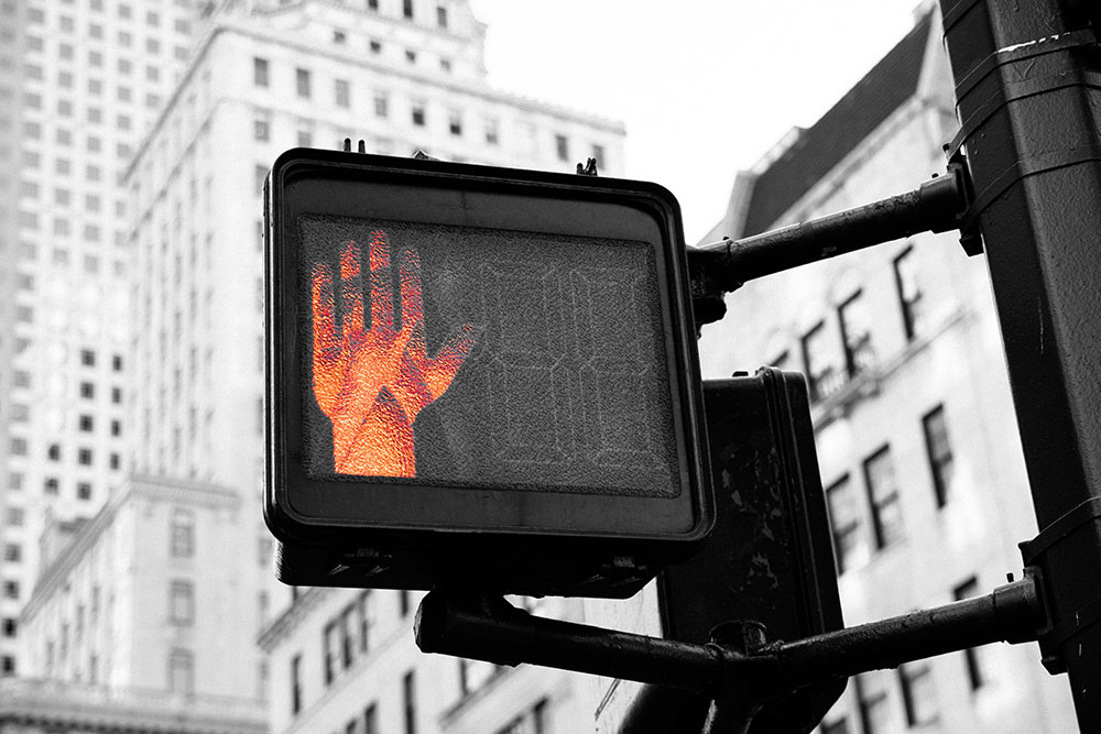 Do not cross sign in city downtown/.